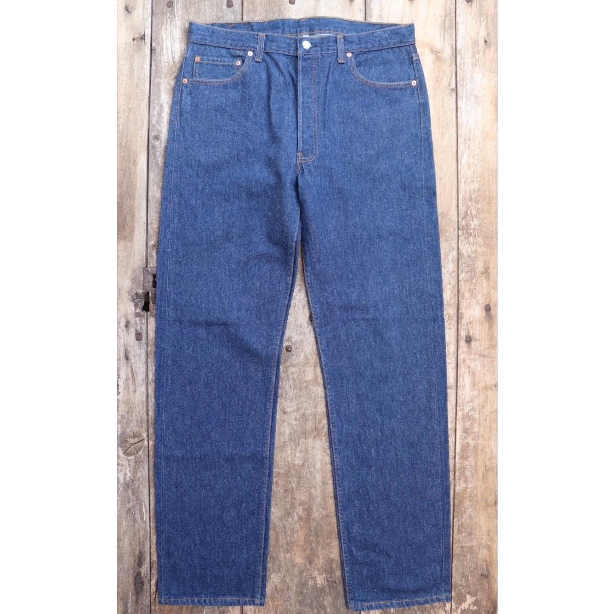 Vintage 1980s Levis 501 denim jeans - made in USA - small e red tab - 35” x 35”