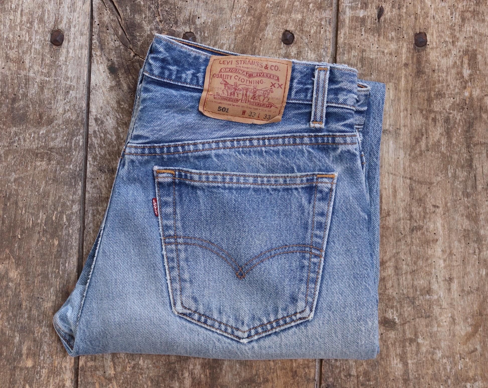 Vintage 1990s Levis 501 denim jeans - made in USA - small e red tab - 32” x 33”