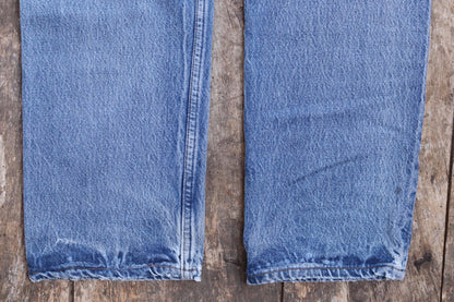 Vintage 1990s Levis 501 denim jeans - made in USA - small e red tab - 32” x 33”