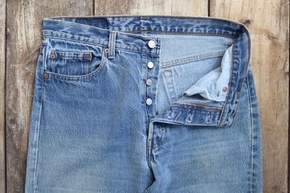 Vintage 1990s Levis 501 denim jeans - made in USA - small e red tab - 32” x 33”
