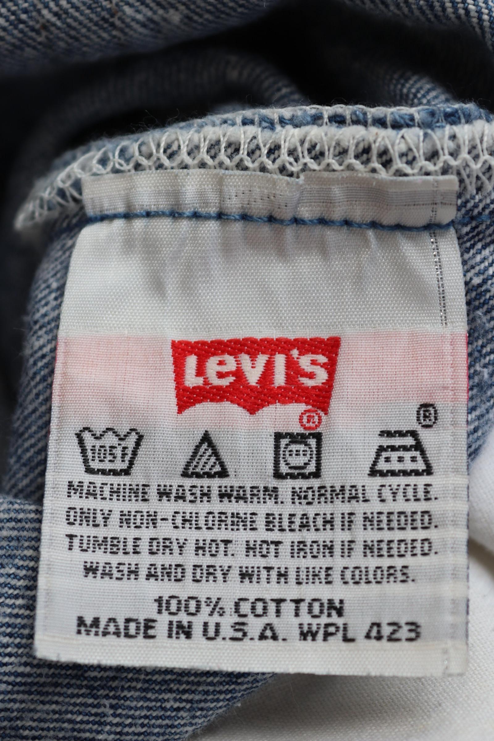 Vintage 1990s Levis 501 denim jeans - made in USA - small e red tab - 33” x 32”