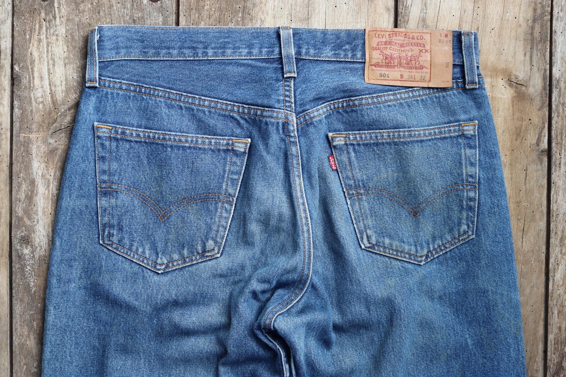Vintage 1990s Levis 501 denim jeans - made in USA - small e red tab - 33” x 32”